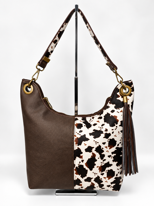 The Uptown Swing Hobo Bag - Cow Print